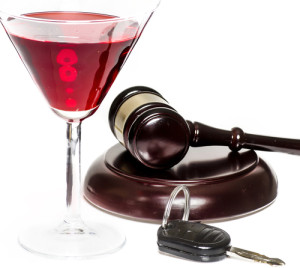 glass of alcohol and car keys